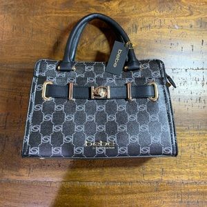 Bebe Evie SM top Handle Satchel with front packet (rare)! . New with tag.